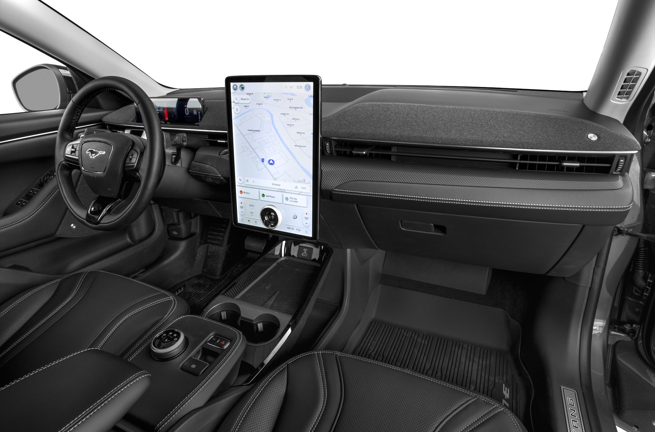 Large vertical touchscreen and digital instrument cluster in modern car interior
