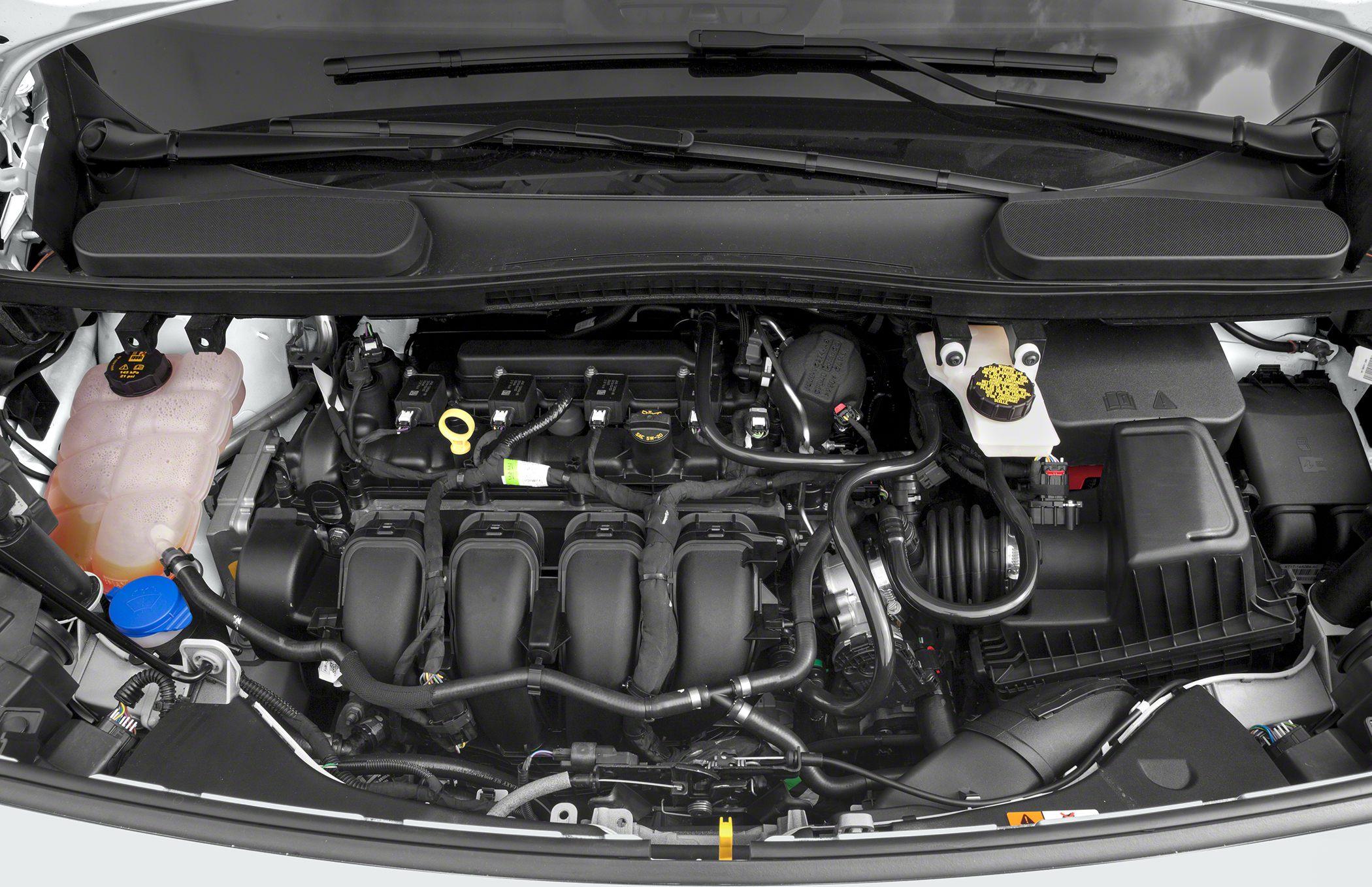 Engine bay with various engine components and fluid reservoirs