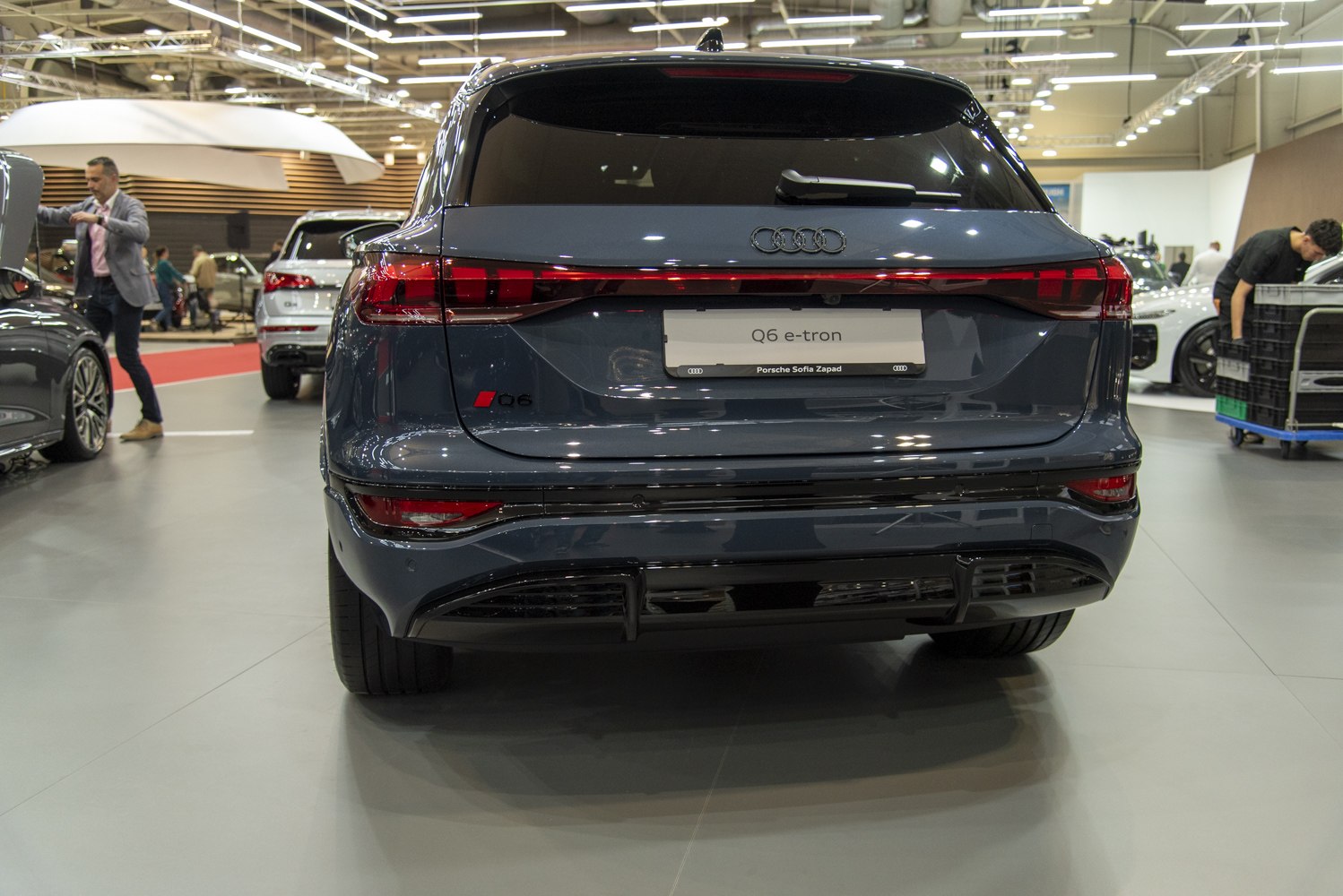 Rear view with continuous LED tail light strip and rear hatch