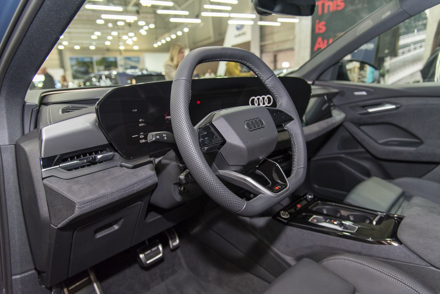 Digital dashboard and multifunction steering wheel in car interior