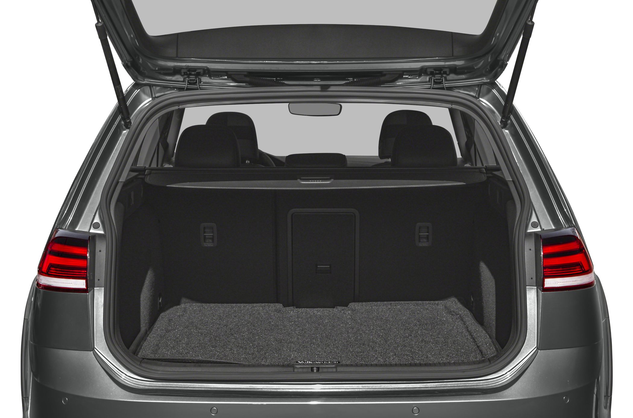 Open rear trunk with spacious cargo area and folded seats