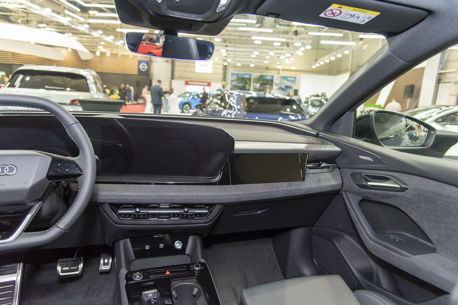 Dashboard interior with large digital displays and modern luxury design