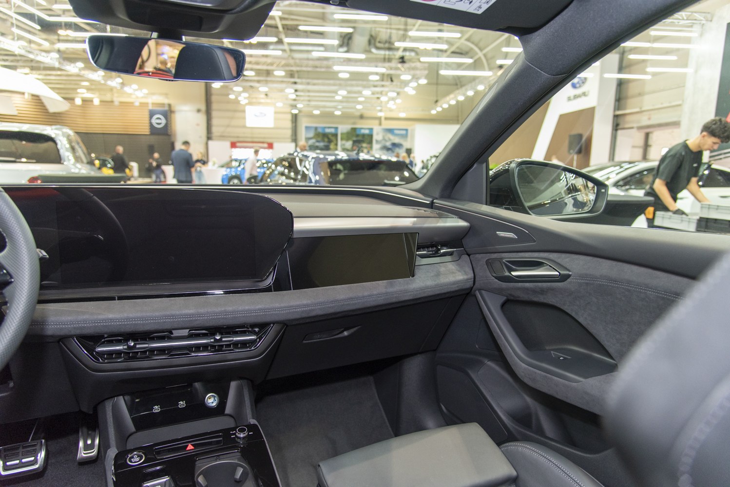 Modern dashboard and door panel with digital displays and premium materials