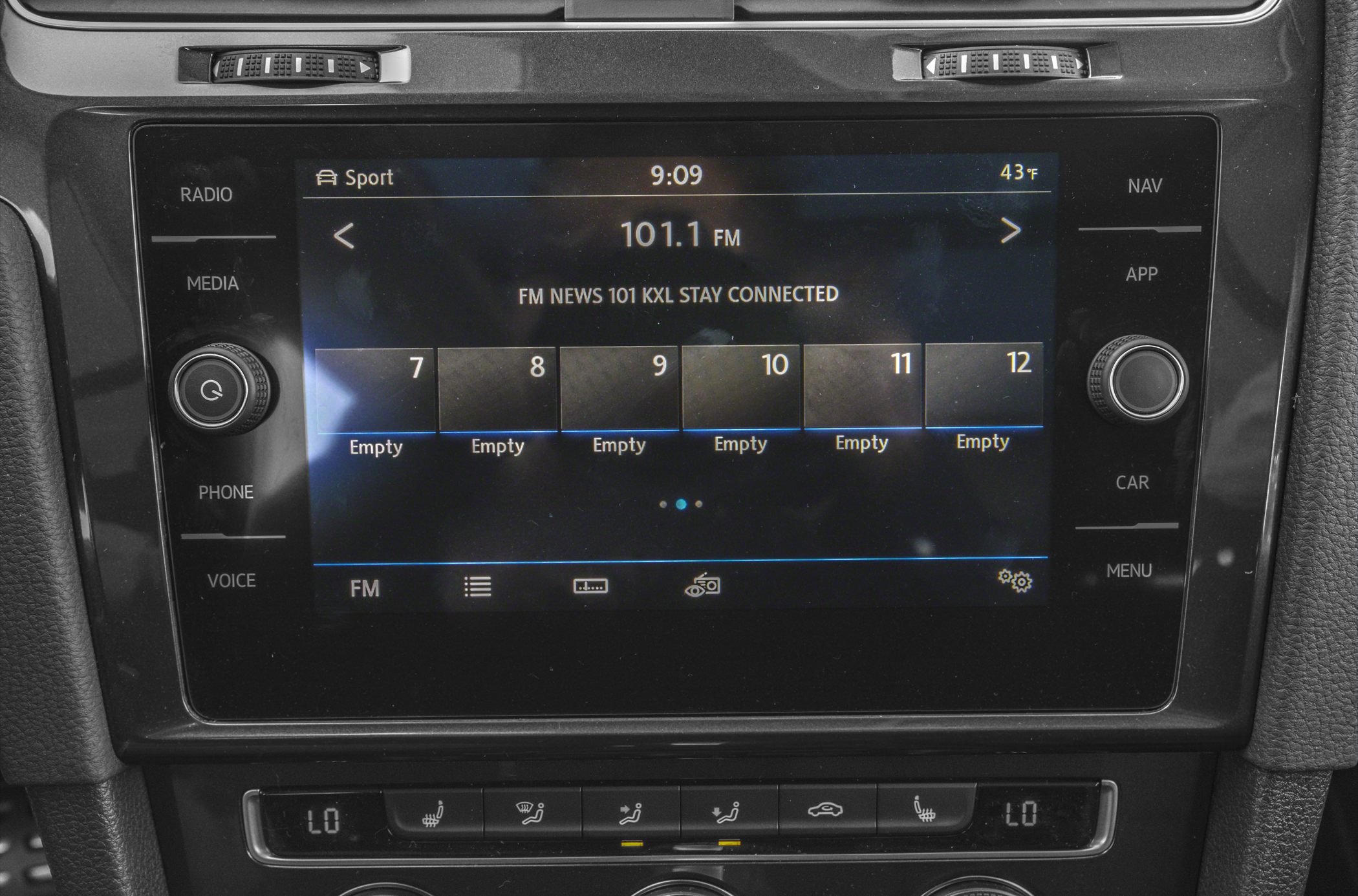 Touchscreen multimedia display and climate control buttons