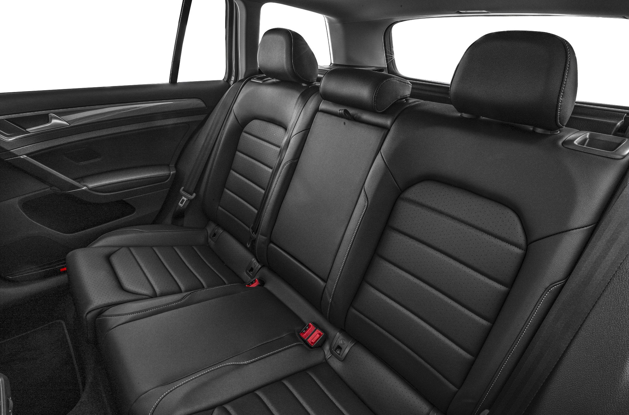 Black leather rear seats with detailed stitching and integrated headrests.