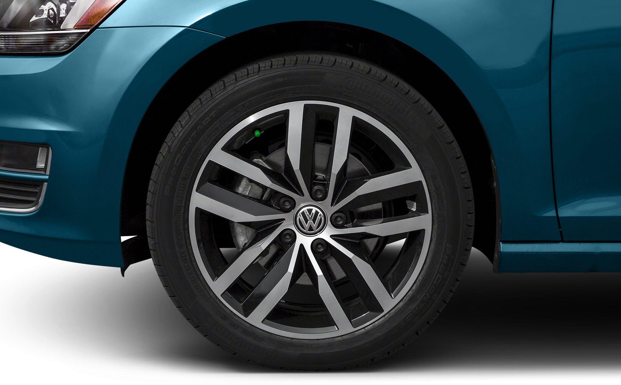 Volkswagen alloy wheel and front fender section with detailed spoke pattern