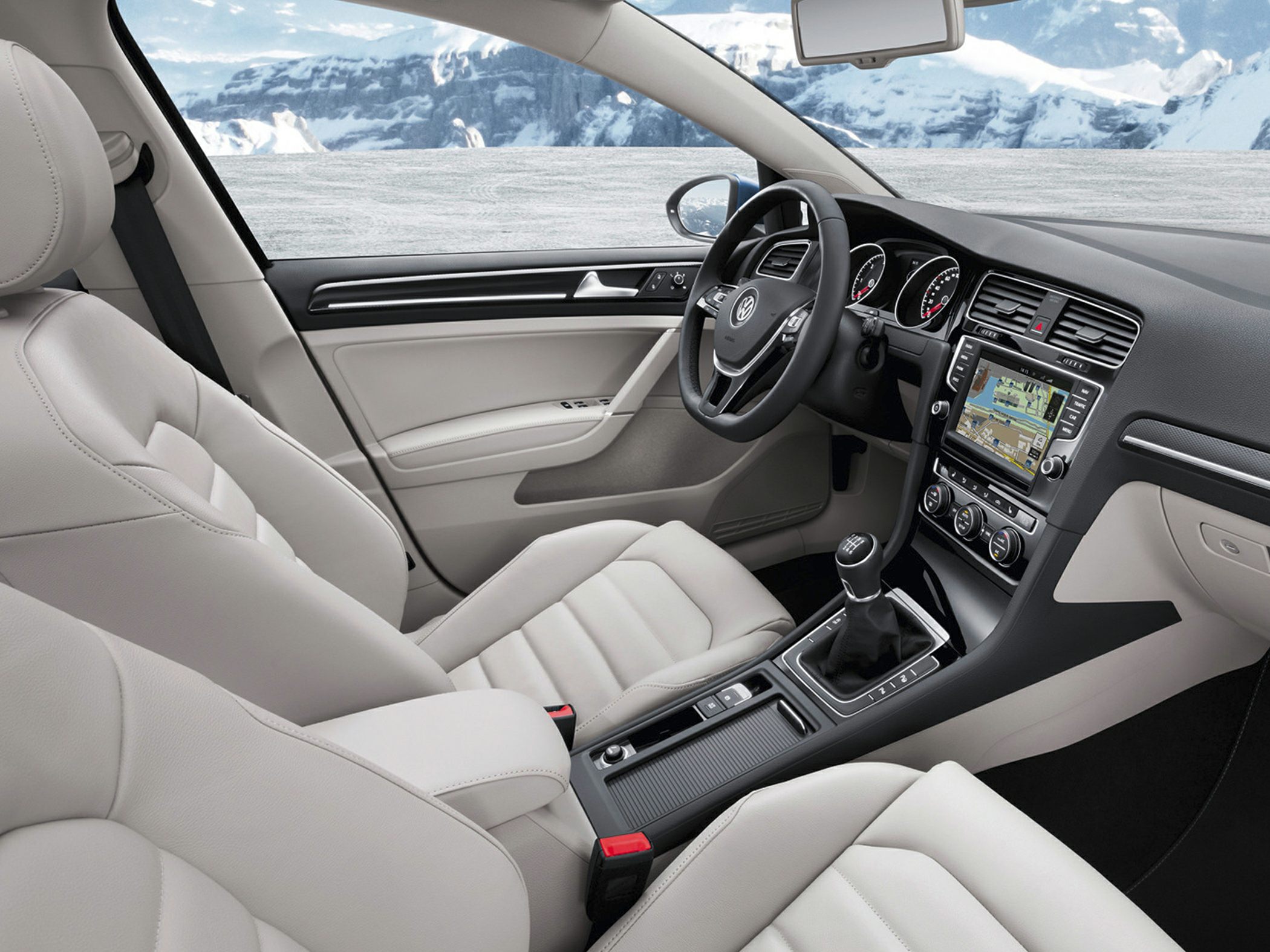 Beige leather seats, navigation system, manual gearshift interior