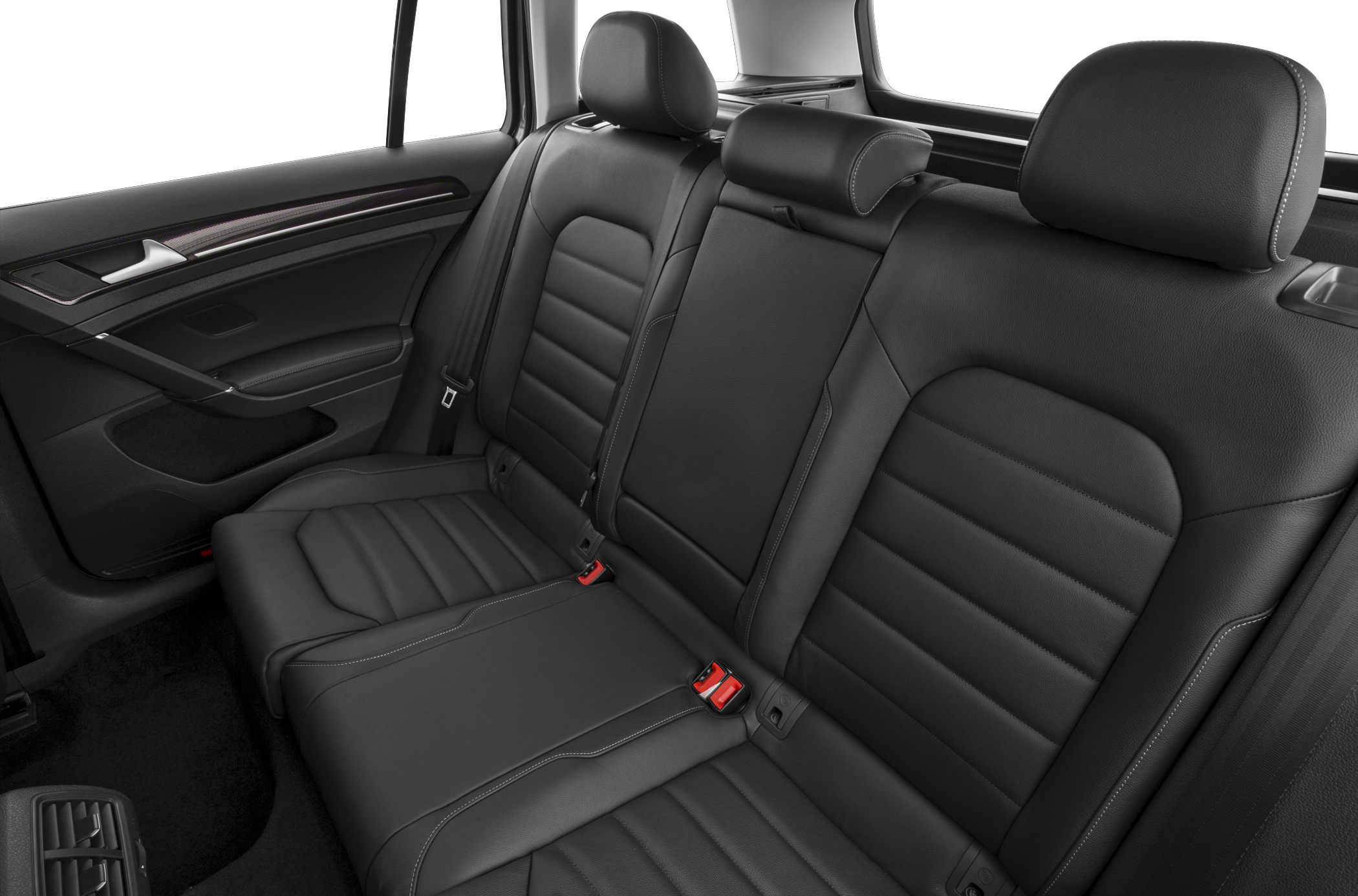 Black leather rear seats with headrests and detailed stitching.