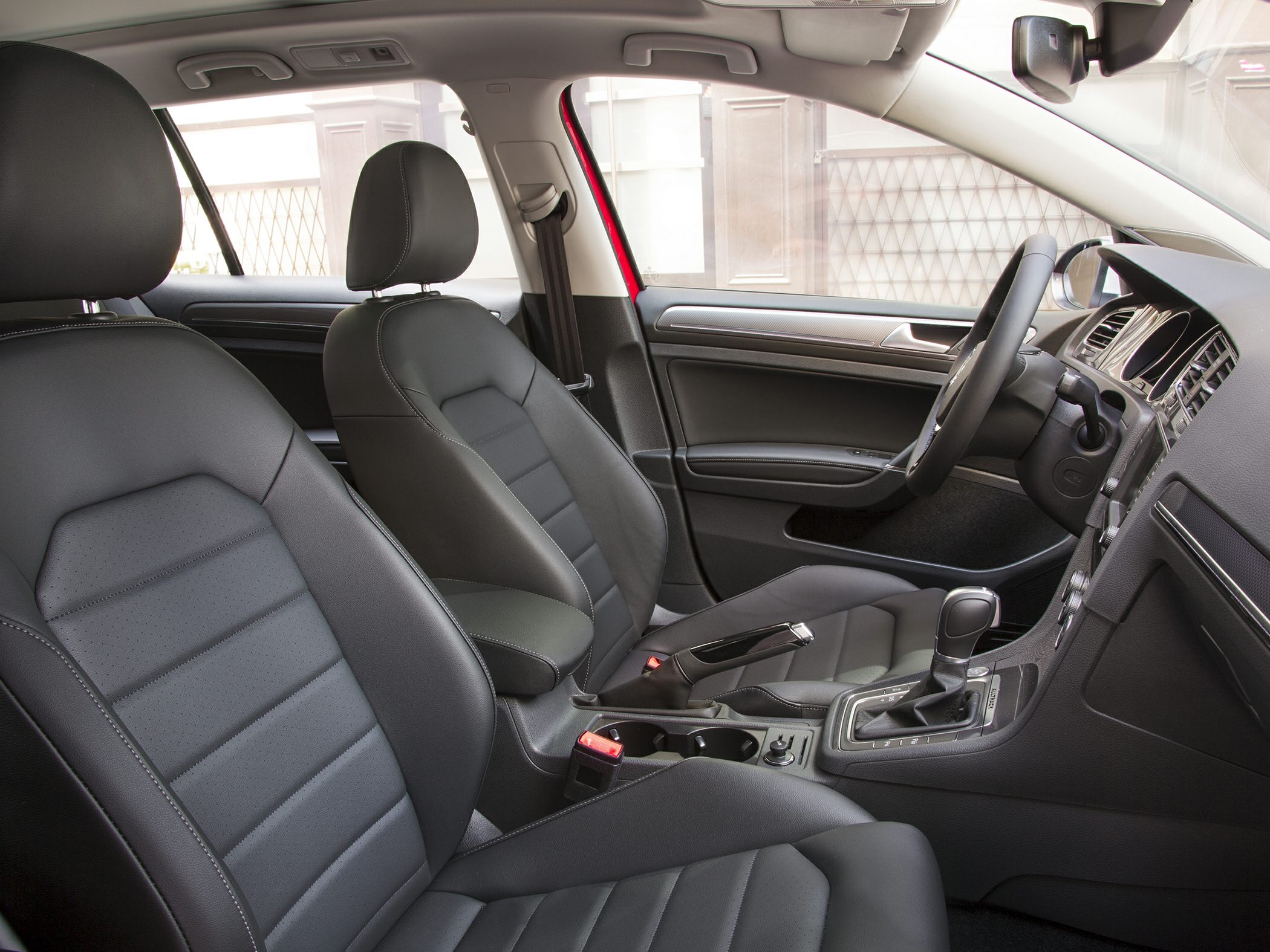 Black leather seats and modern interior dashboard
