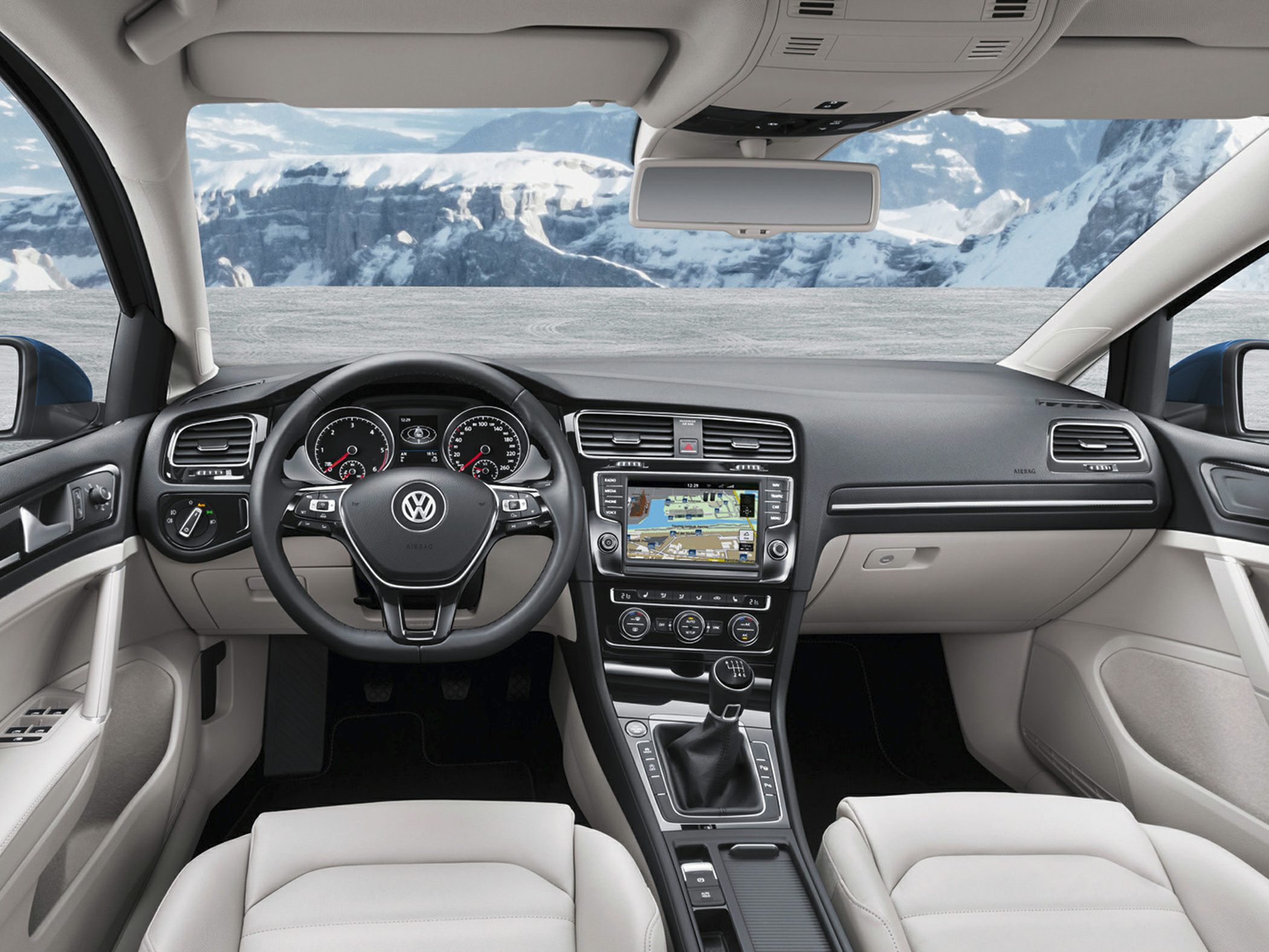 Dashboard with navigation touchscreen and manual transmission gear stick