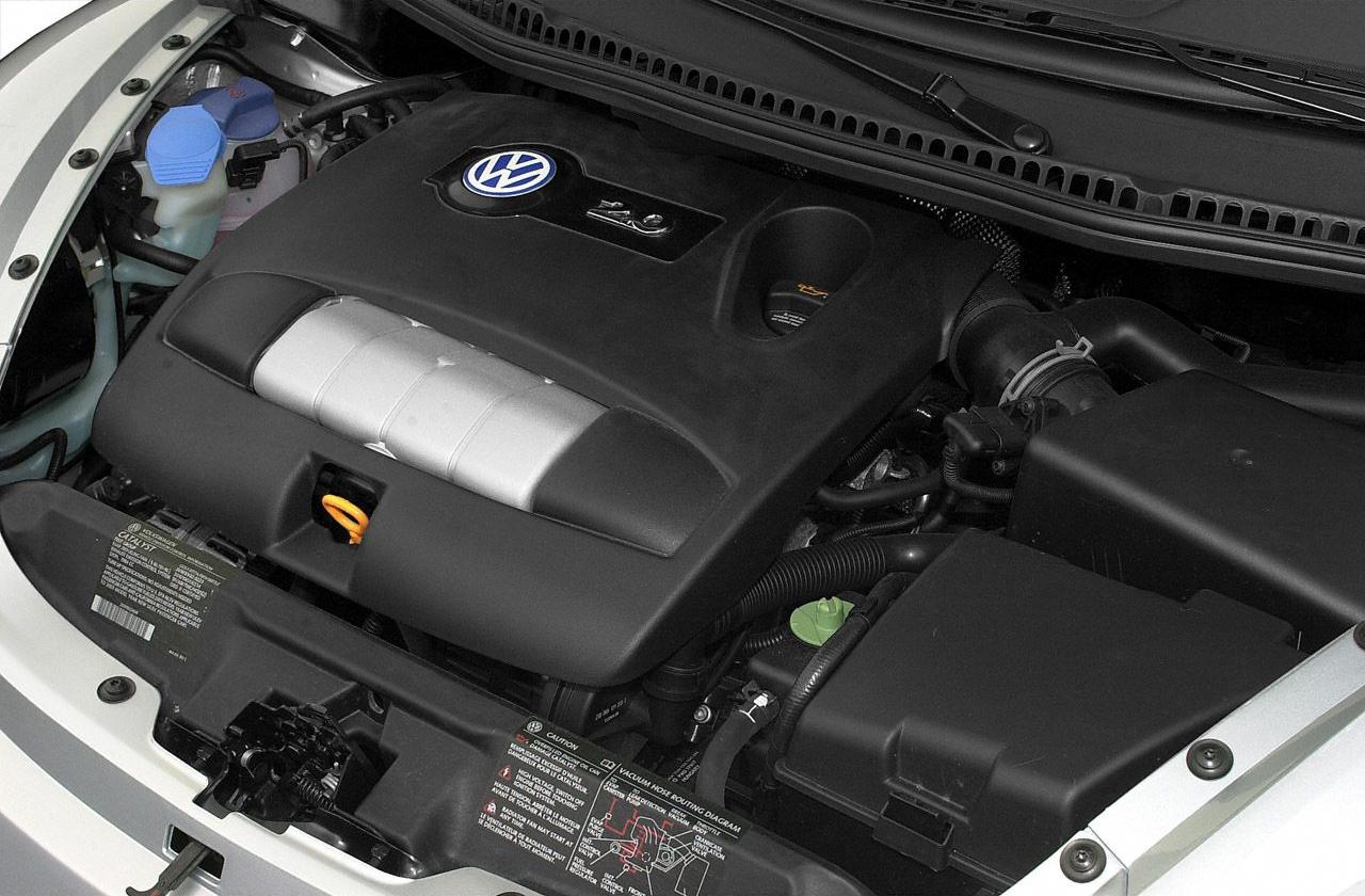 Close-up of 2.0L engine with VW logo under hood