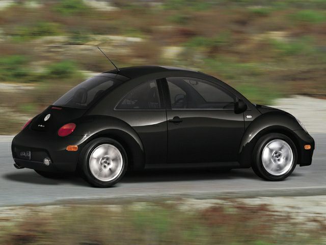 Black New Beetle 9C side profile with rounded shape and alloy wheels