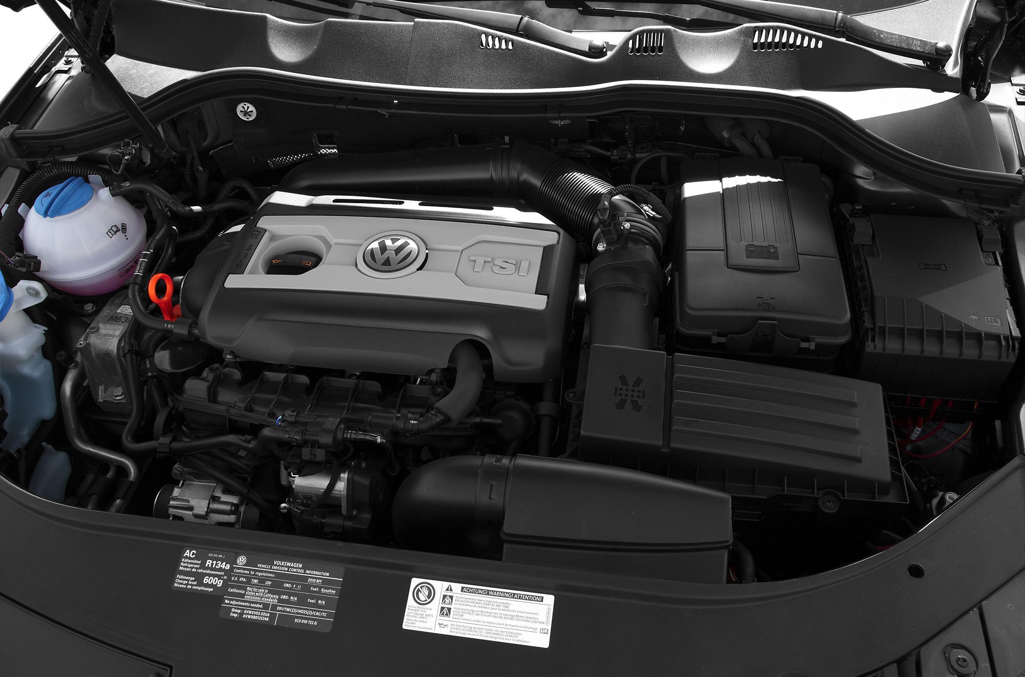 TSI engine bay with Volkswagen logo and surrounding components