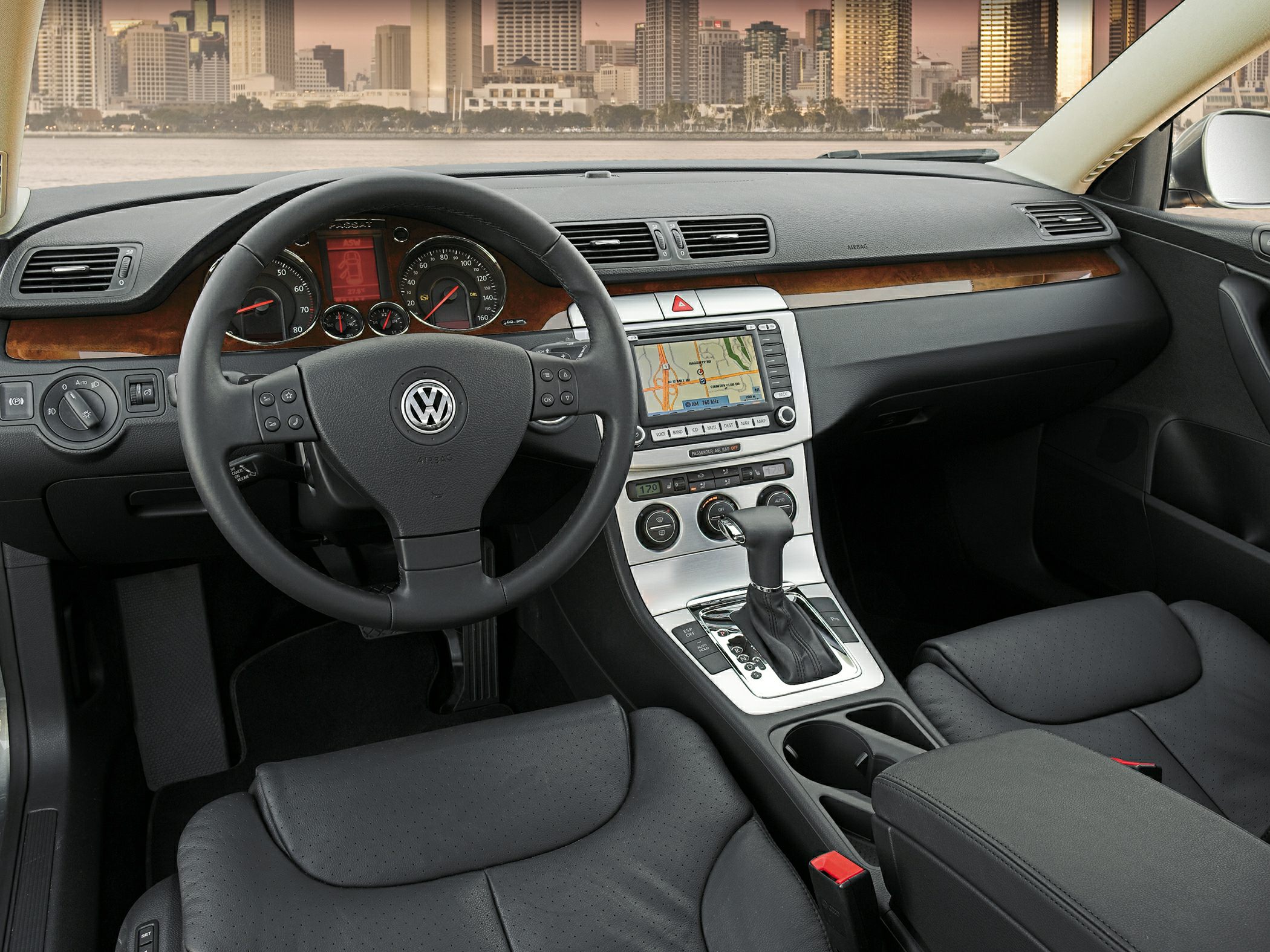 Leather seats, dashboard with navigation, and steering wheel controls