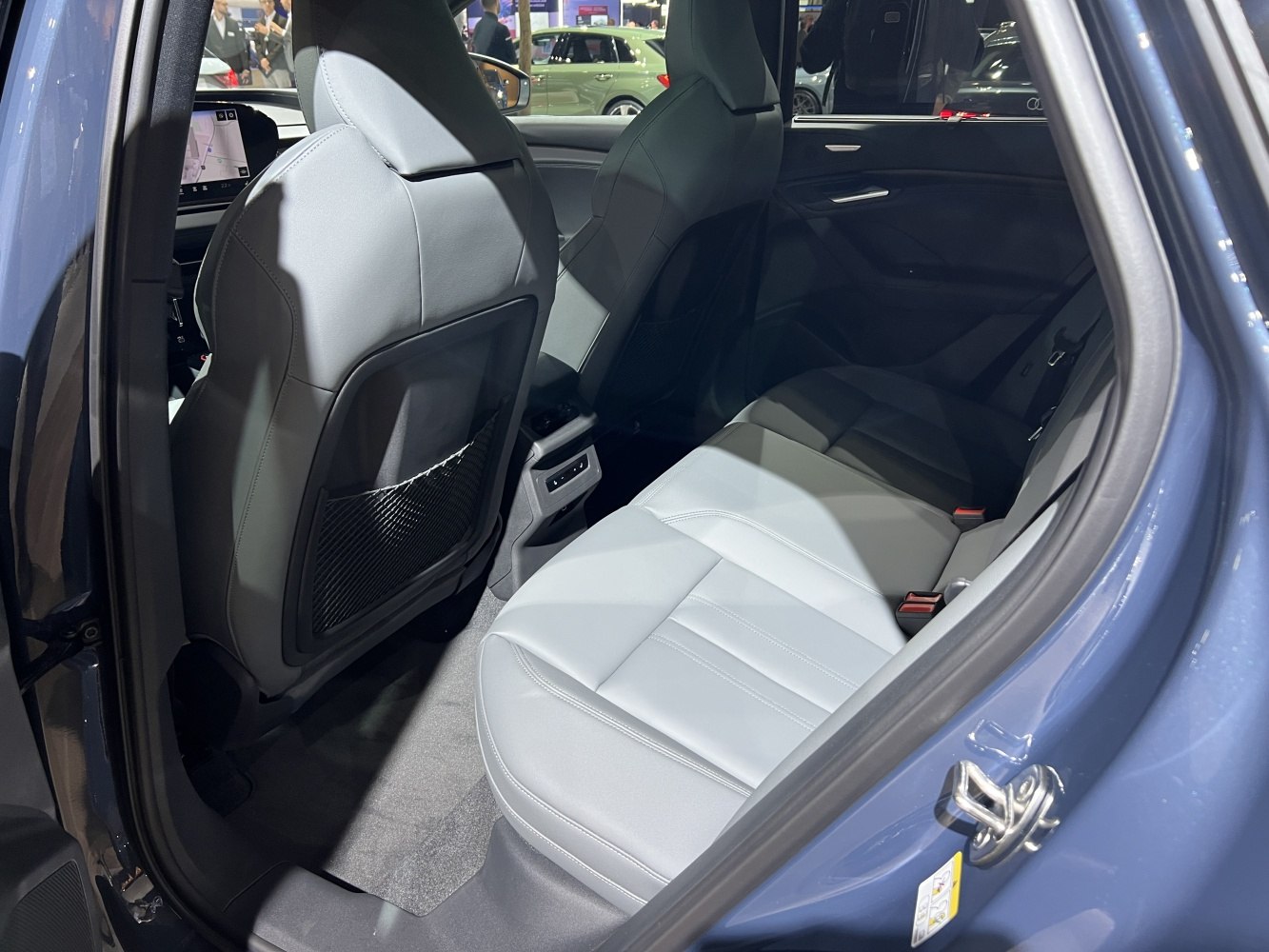 Leather rear seats and spacious legroom of a modern SUV interior