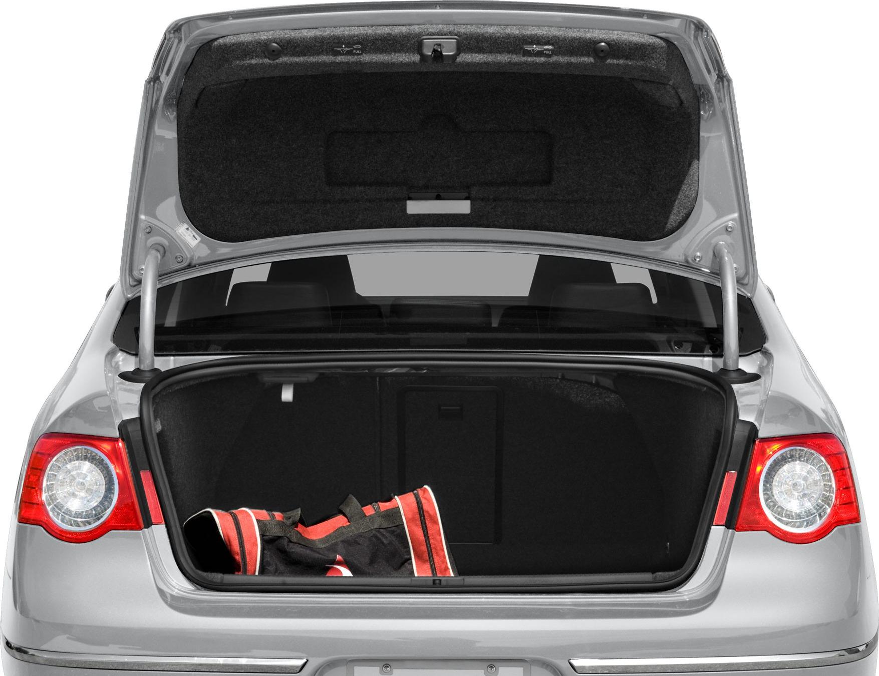 Open rear trunk with spacious cargo area and sports bag