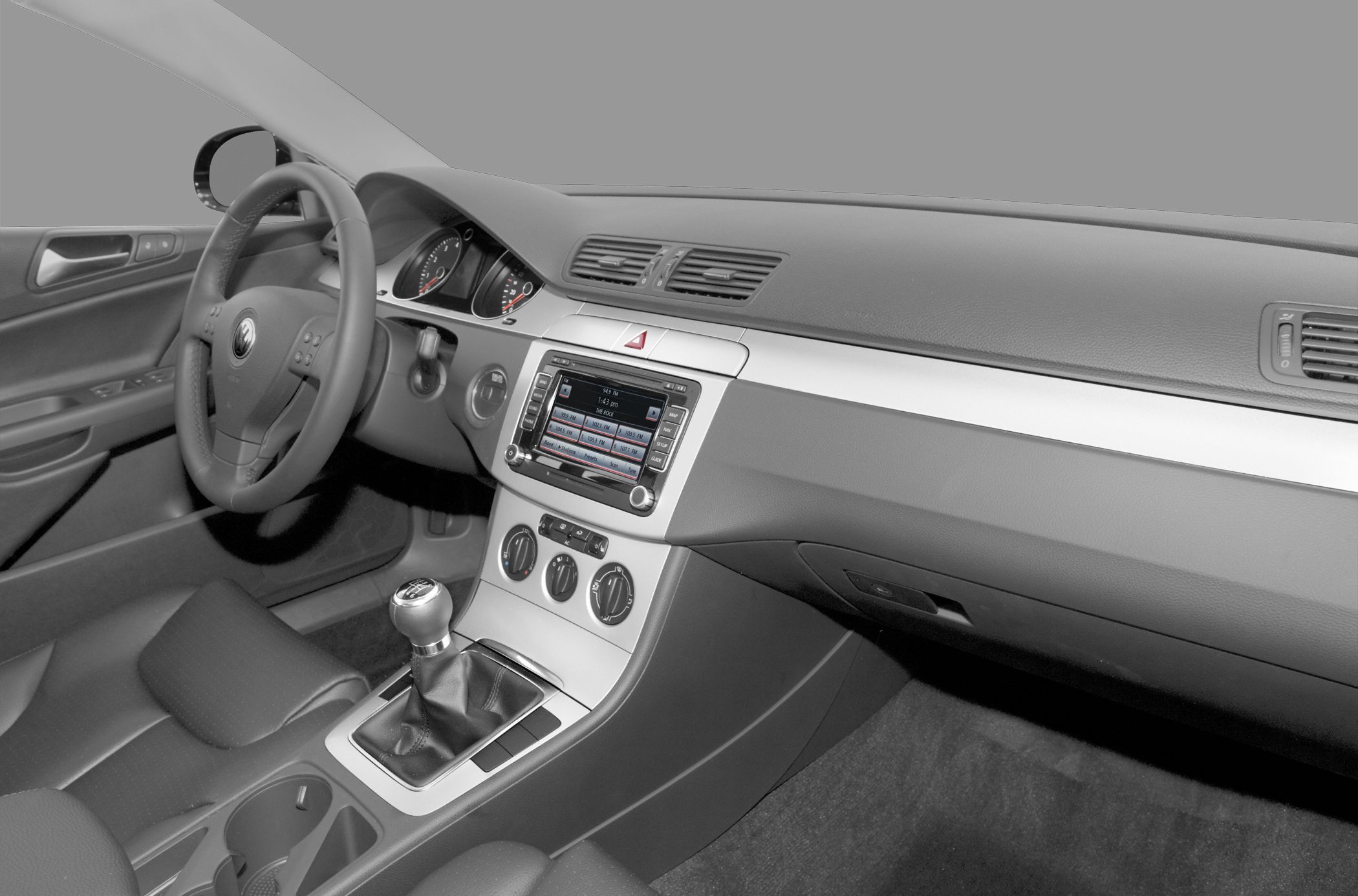Car interior with manual gearbox and dashboard controls