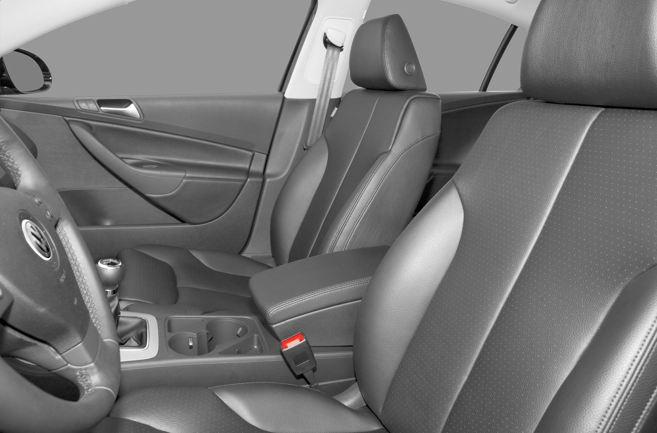 Leather front seats and manual gear shift in car interior