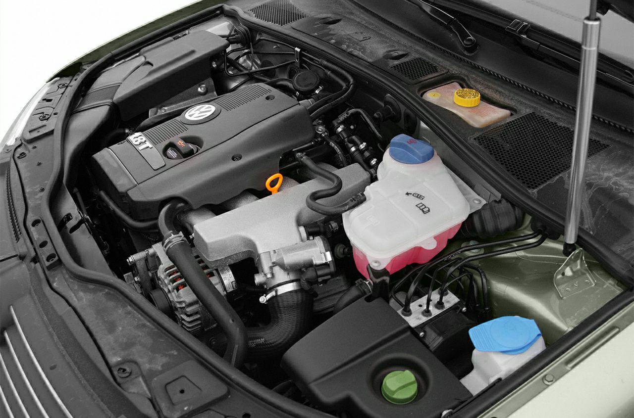 1.8T turbo engine bay with colored fluid reservoirs