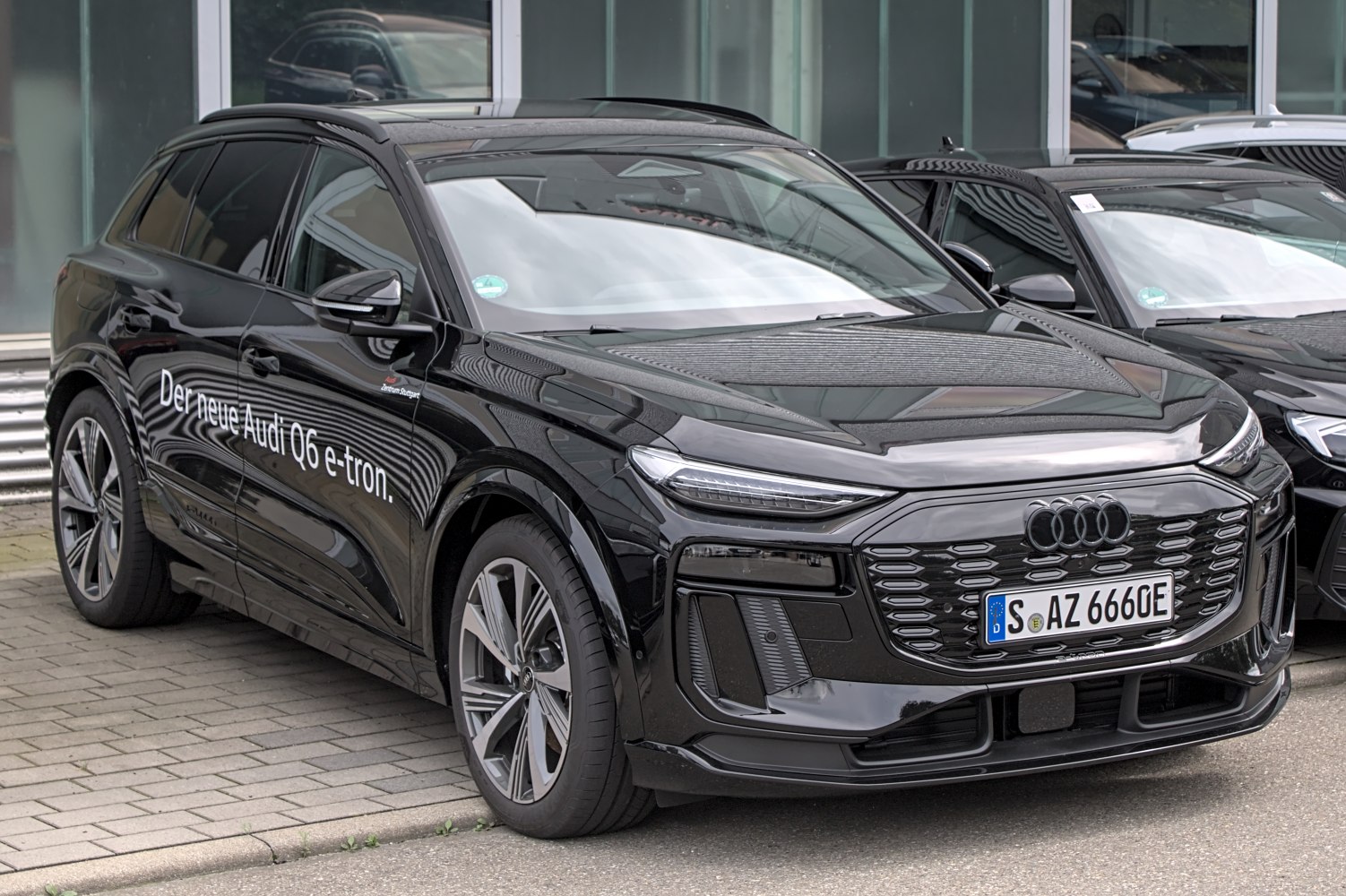 Electric SUV front with signature grille and LED headlights
