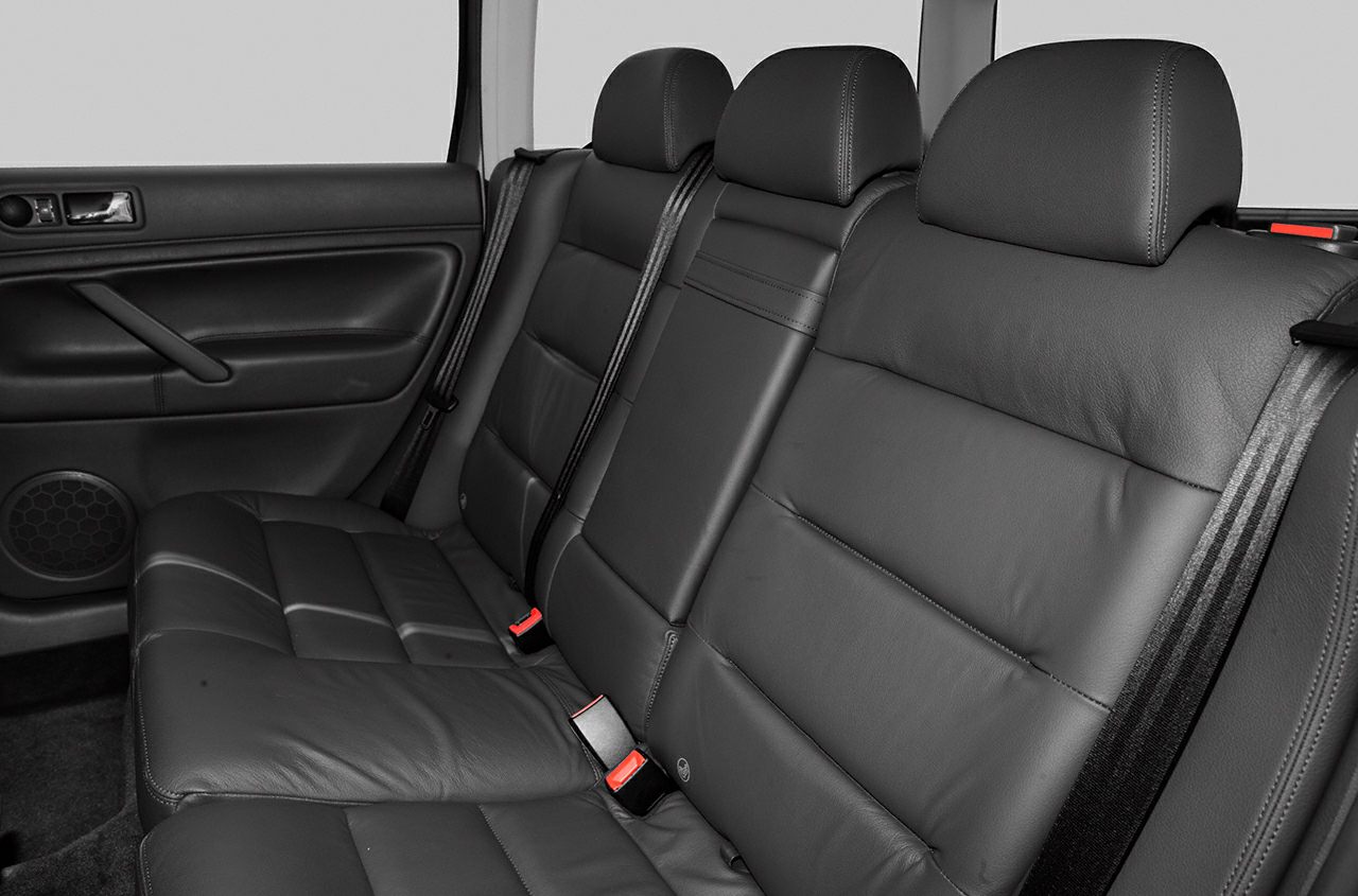 Black leather rear seats with headrests and seat belts
