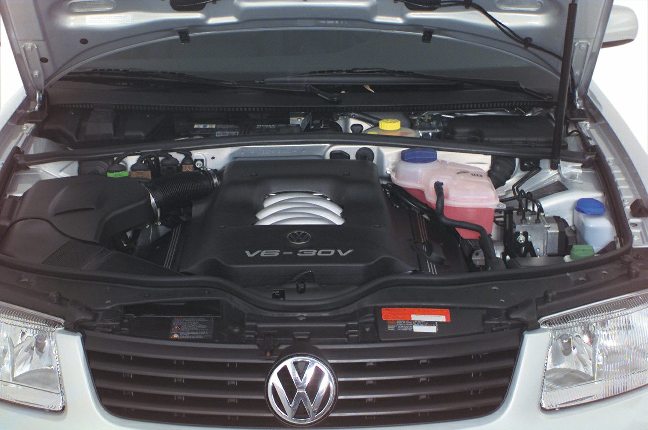 V6 30V engine bay with visible components and fluid containers