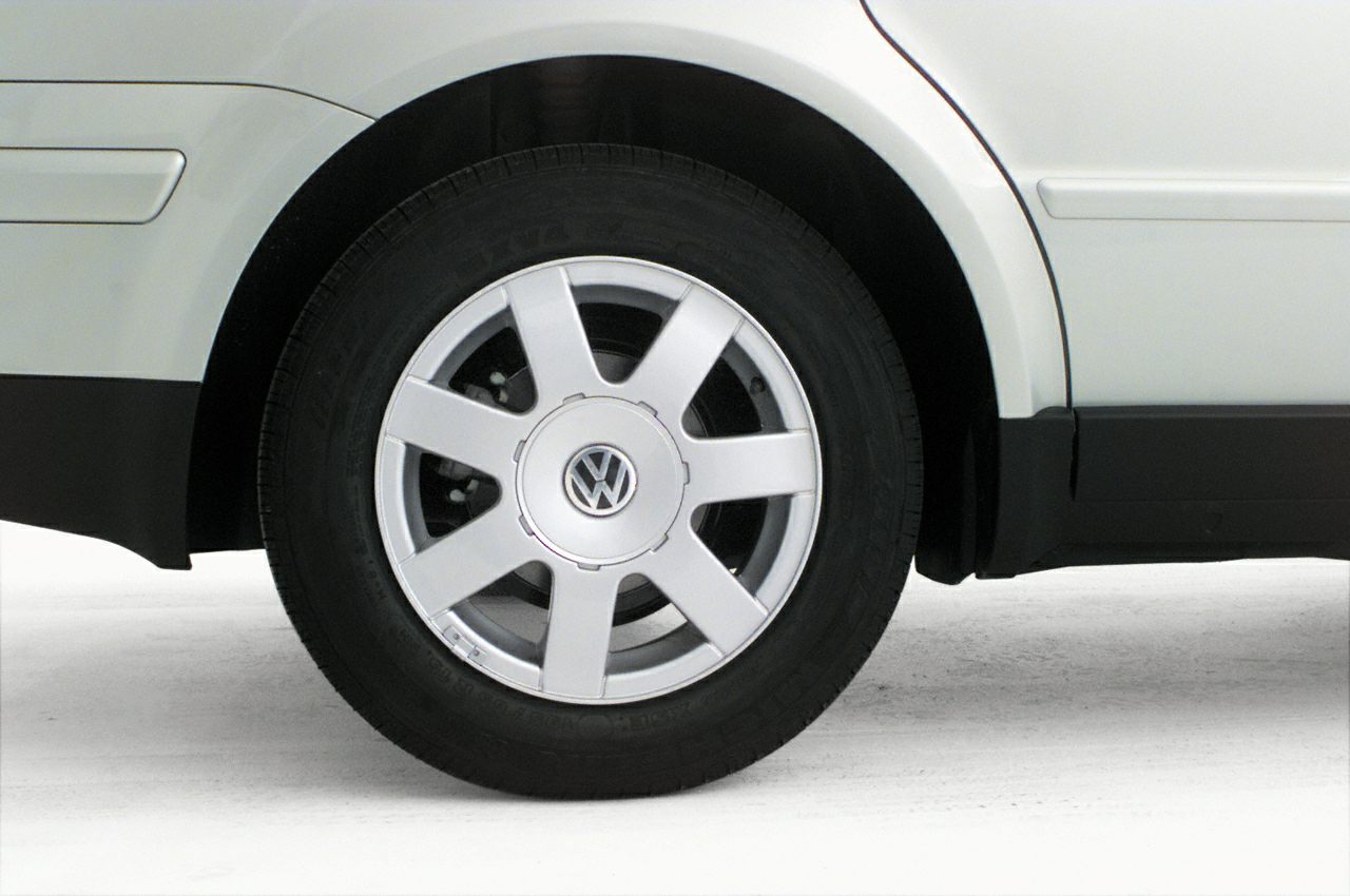 Close-up of a five-spoke alloy wheel with tire and Volkswagen emblem