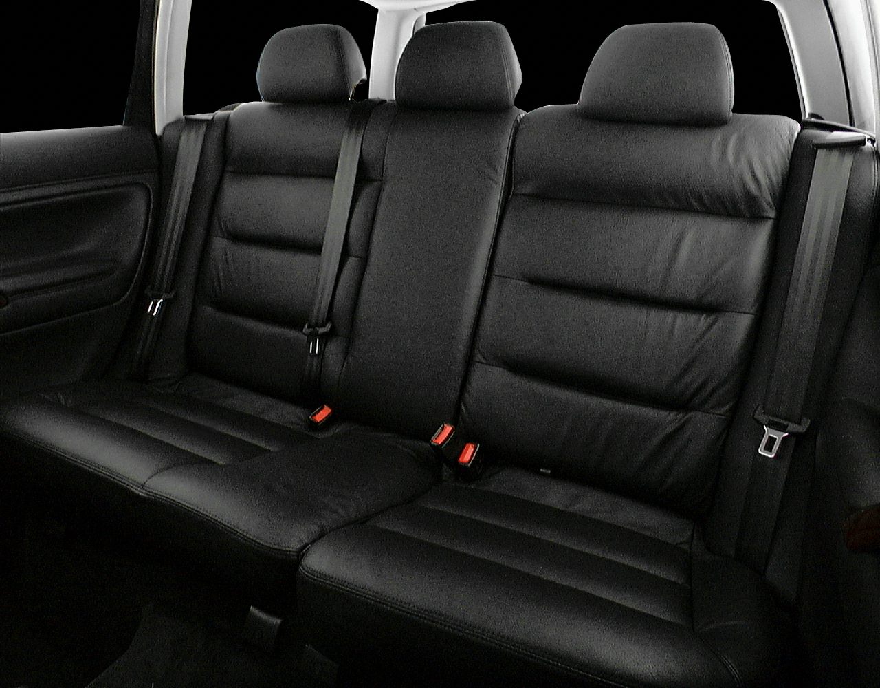 Black leather rear seats with headrests and seat belts