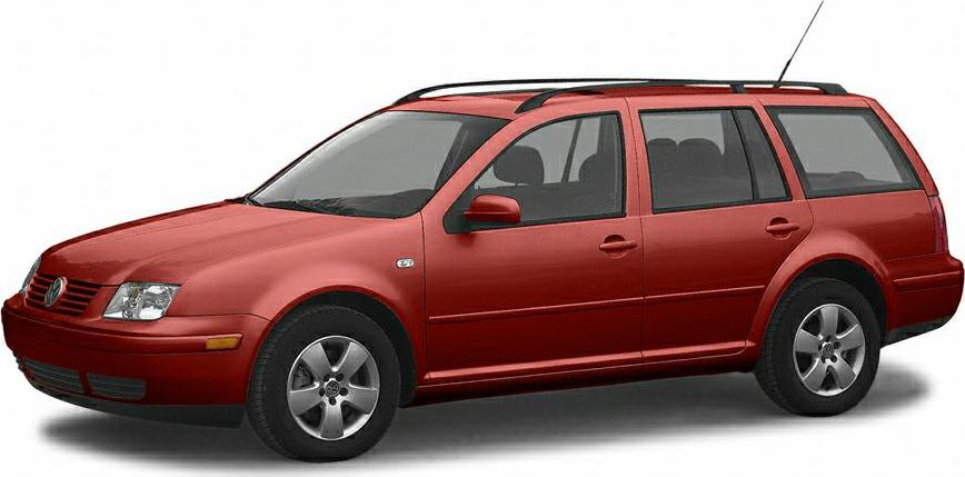 Red station wagon with alloy wheels and roof rack