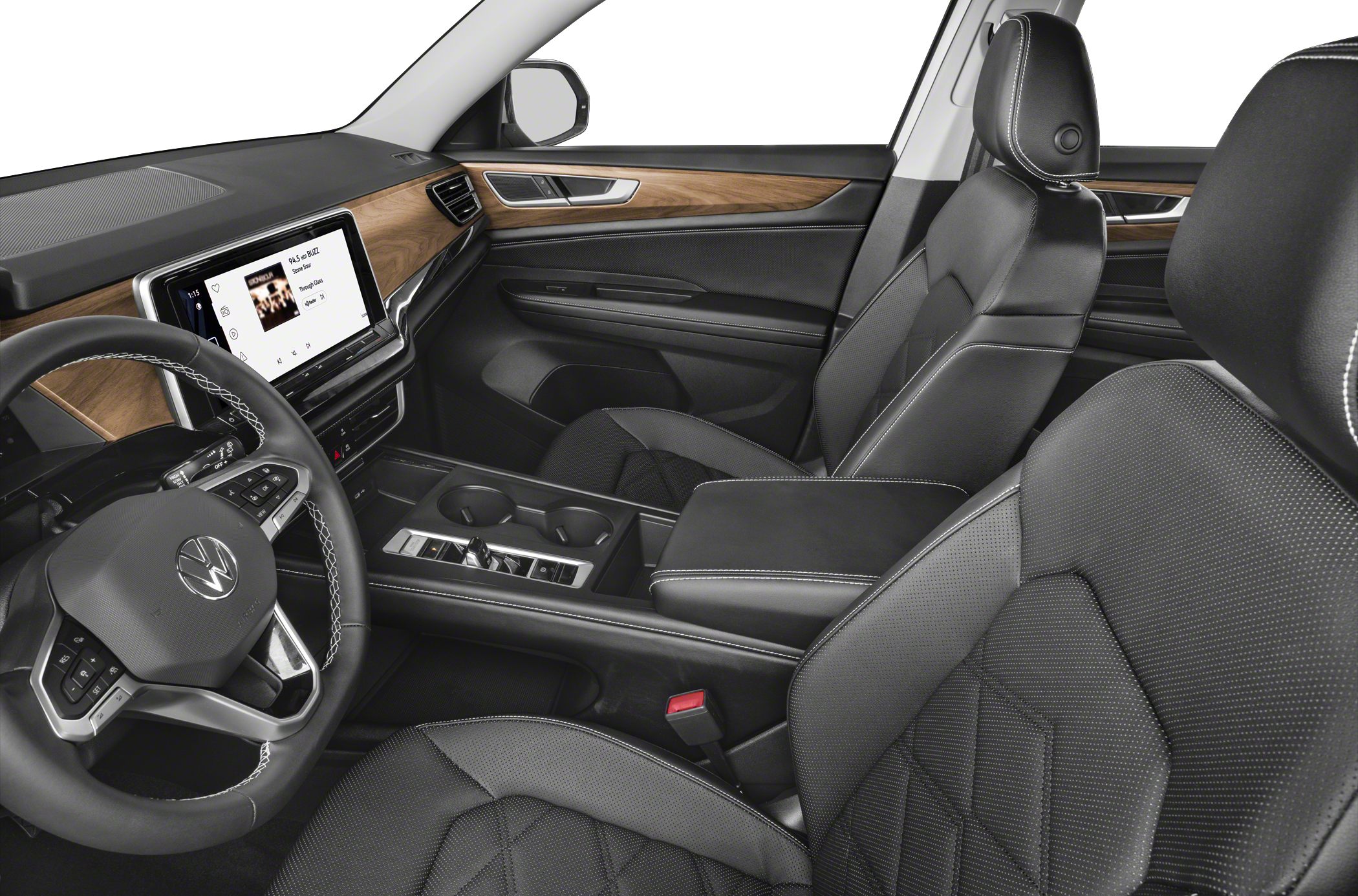 Interior view with leather seats, wood trim, and digital infotainment