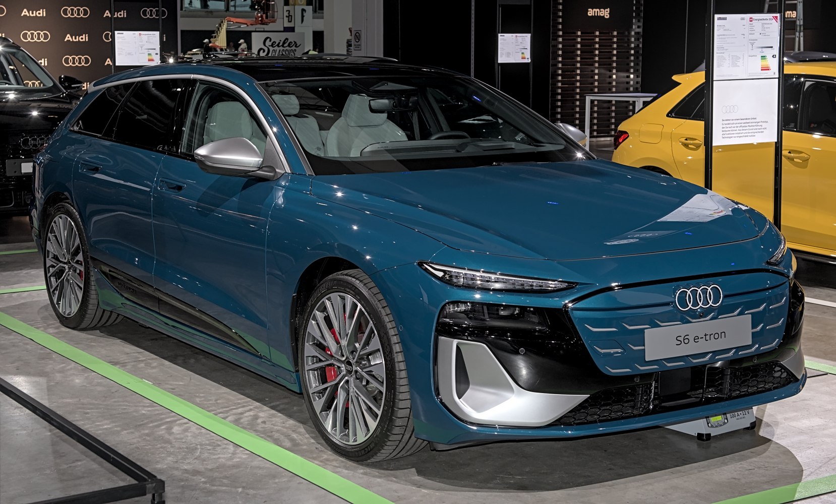 Blue electric sportback with sleek front fascia and aerodynamic design