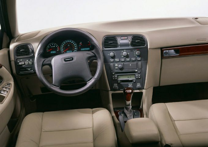 Beige interior with dashboard, steering wheel, and gear shifter