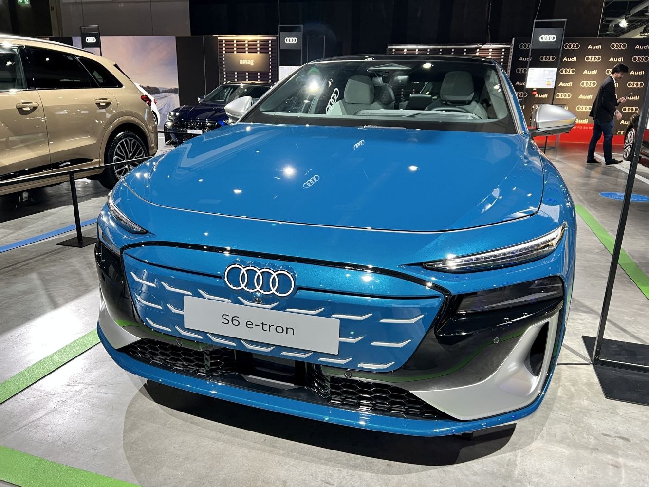 Front grille and sleek headlights of a modern electric vehicle