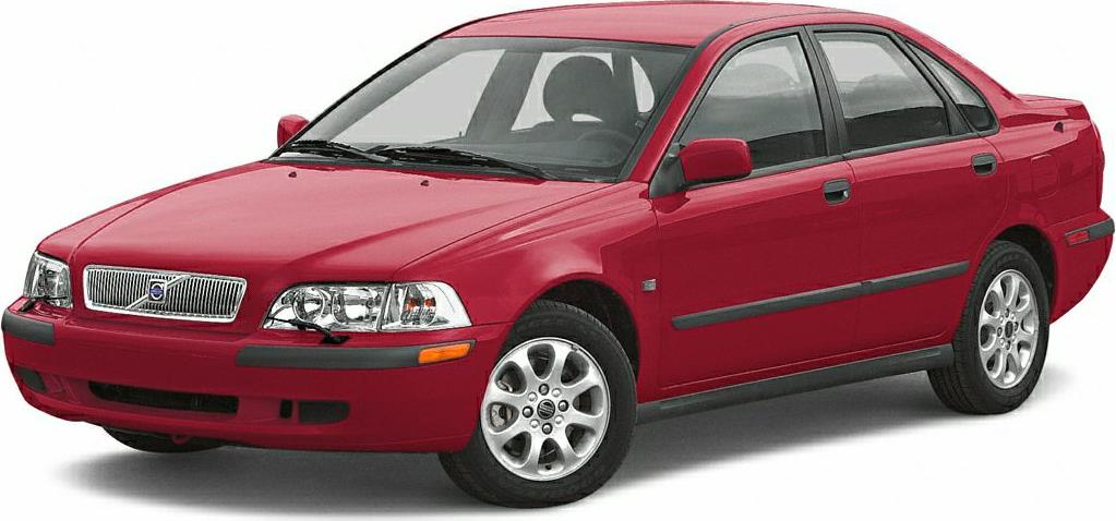 Red compact sedan with distinct front grille and alloy wheels