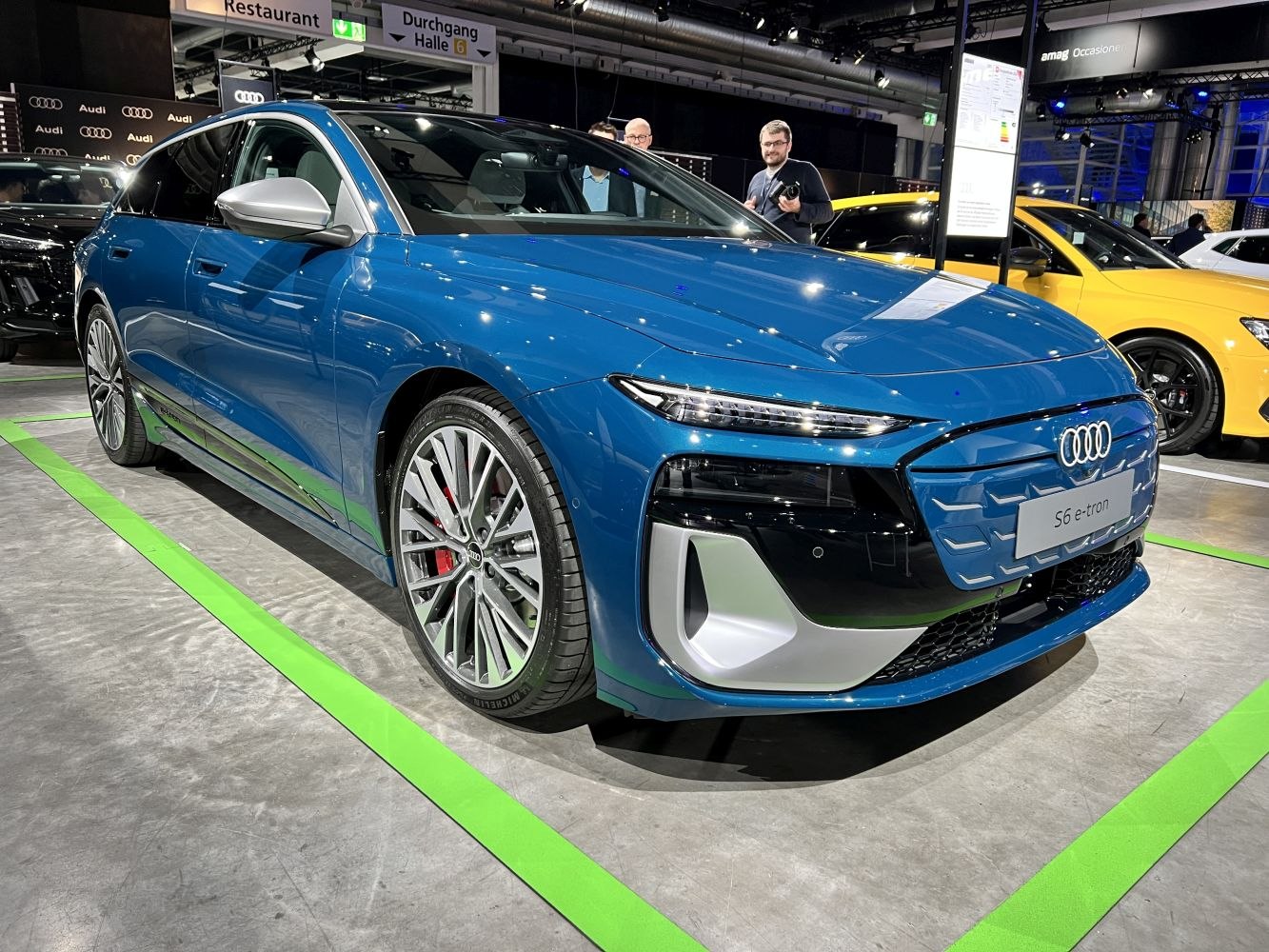 Electric wagon with sleek headlights and aerodynamic front fascia