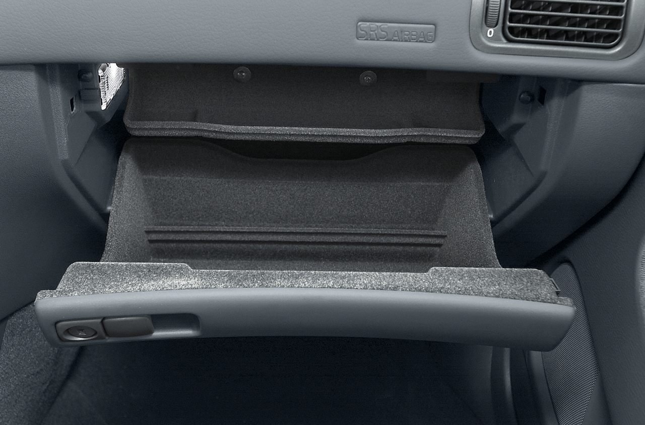 Open interior glovebox storage with dashboard elements