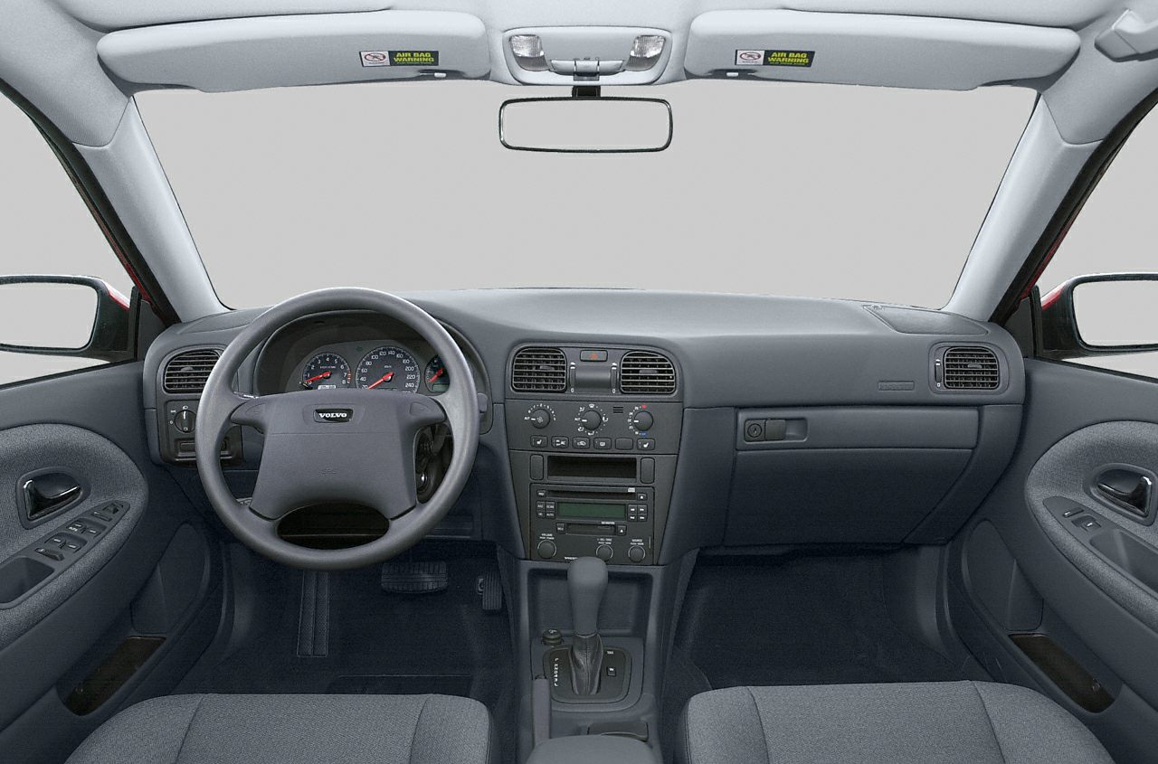 Dashboard and center console with steering wheel and control panels.