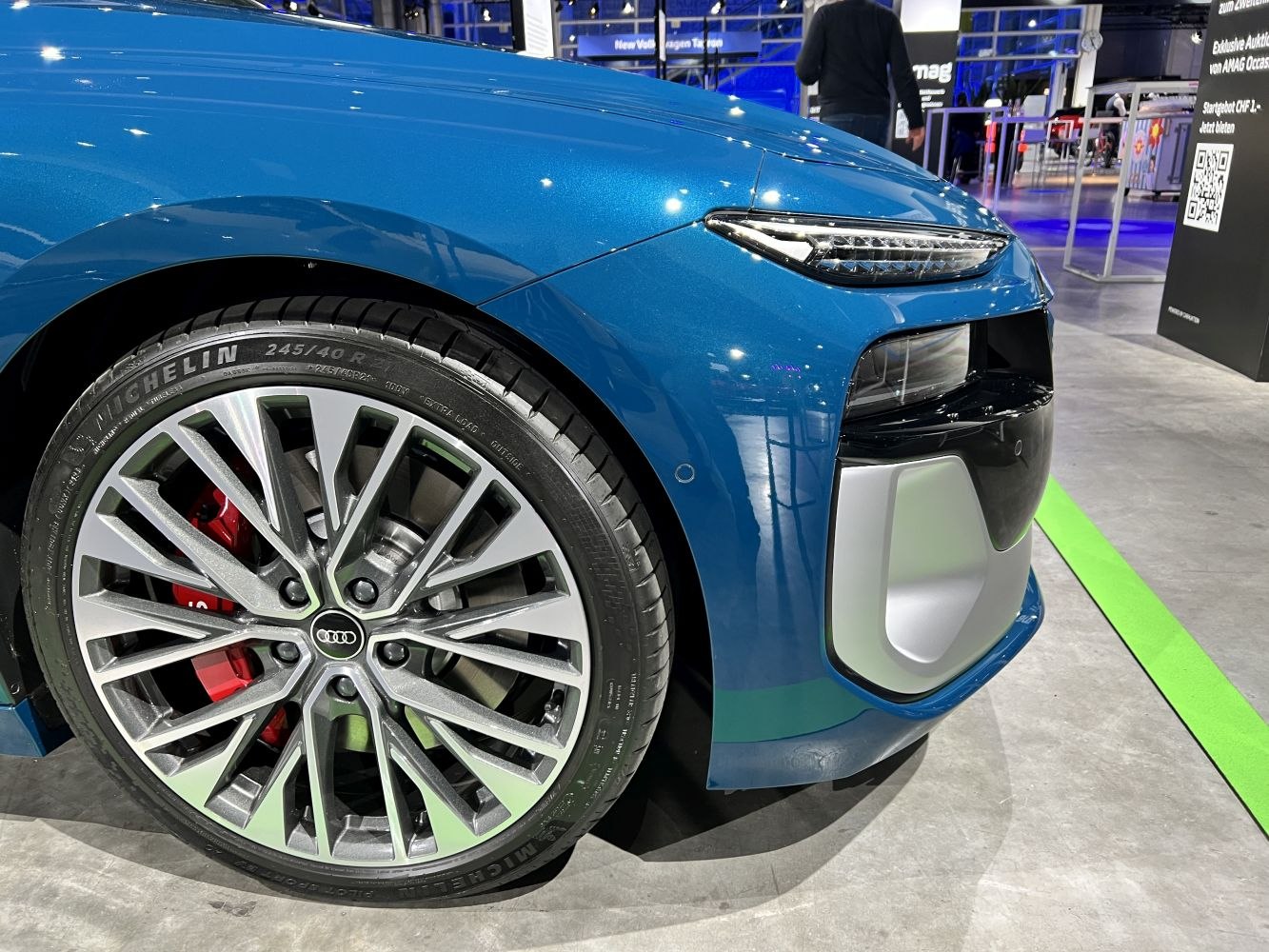 Front alloy wheel with Michelin tire and LED headlight detail