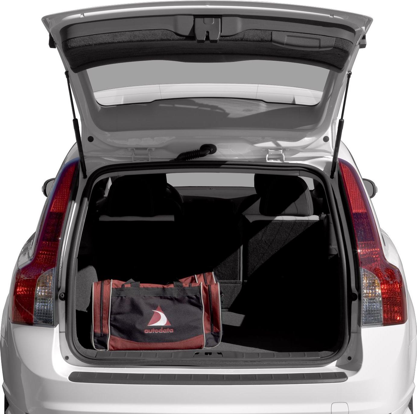 Open rear hatch with visible spacious cargo area and a bag inside