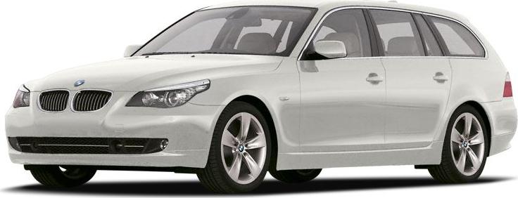 White station wagon with sleek headlights and aerodynamic body.