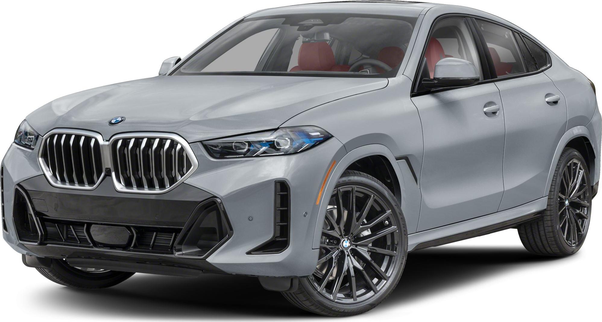 Close-up of front grille, headlight, and sporty wheel of a luxury SUV