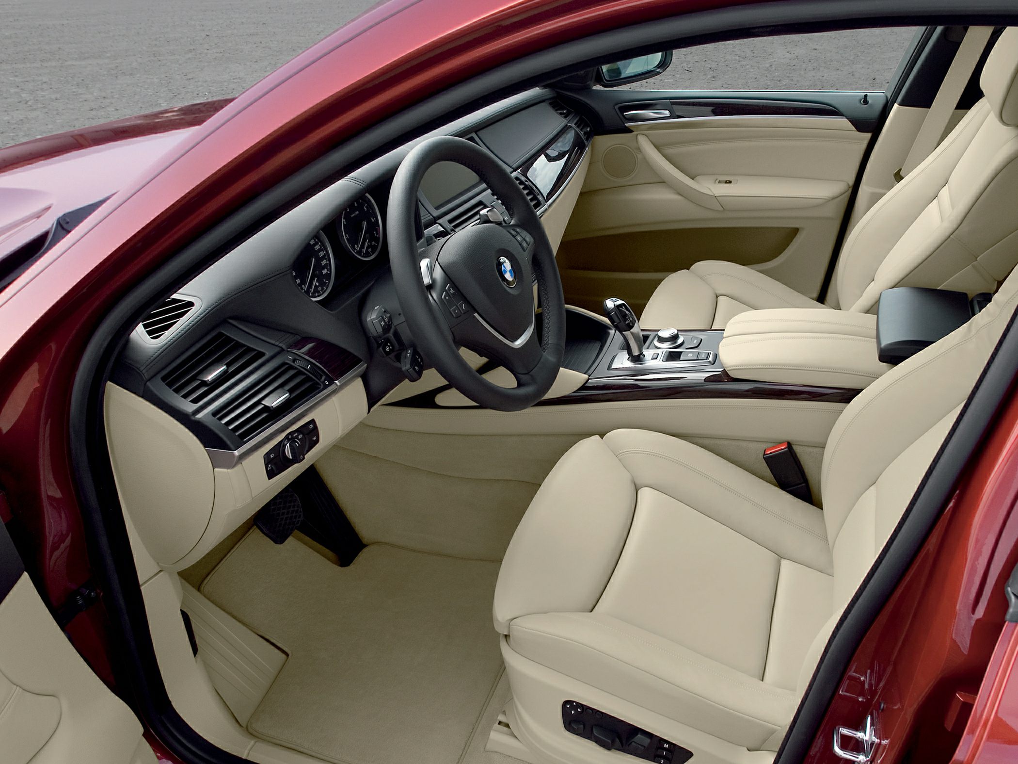 Beige leather interior with dashboard and center console features