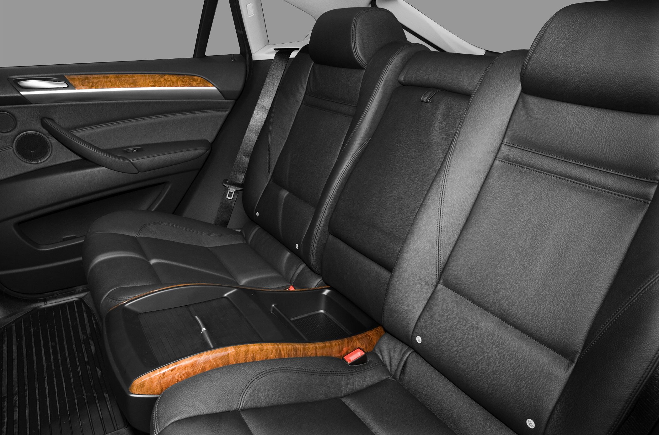 Rear leather seating with elegant wood trim interior