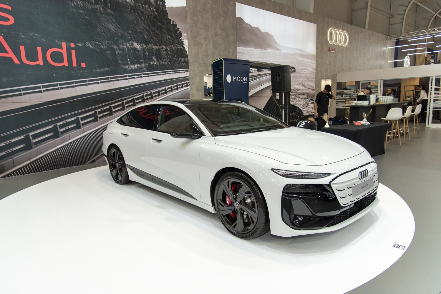 Aerodynamic electric sportback with LED headlights and alloy wheels.