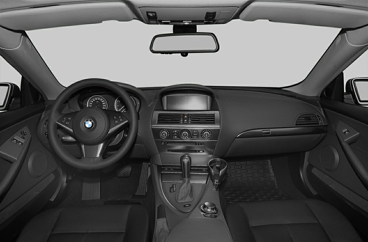 Dashboard and steering wheel with center console controls