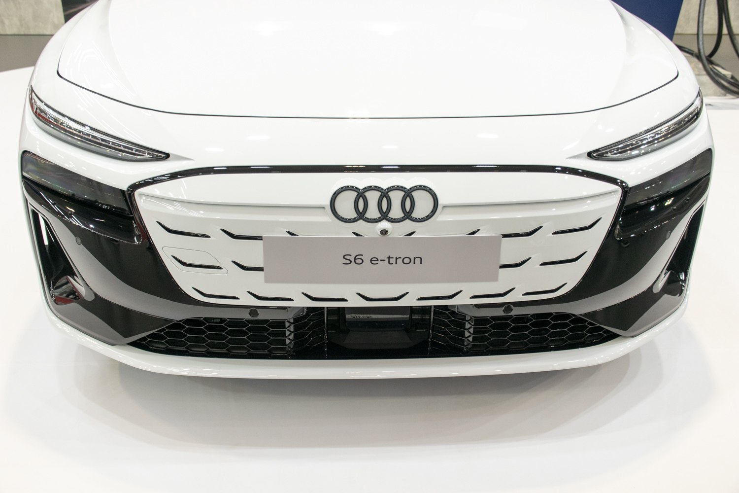 Close-up of front grille and LED headlights