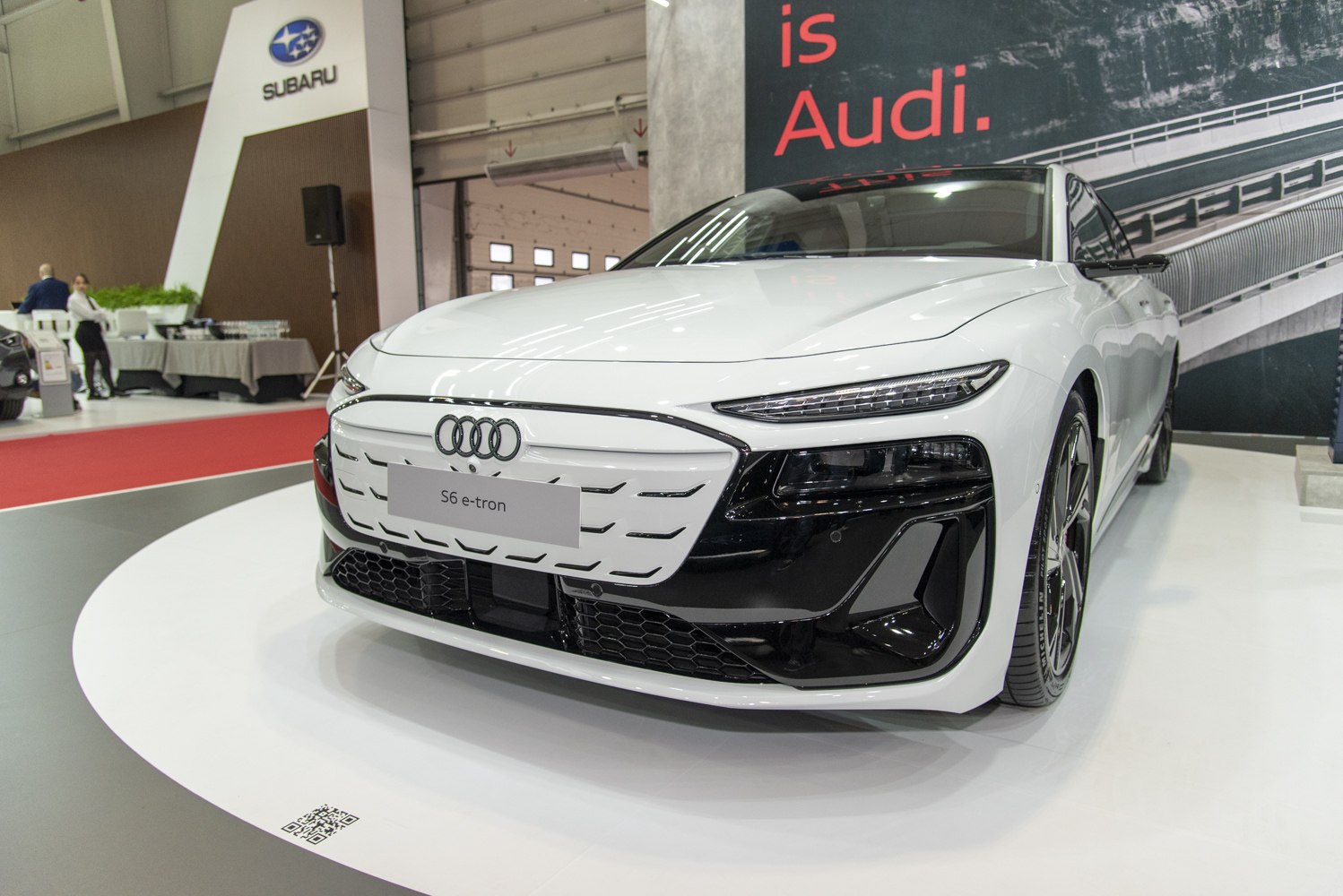 Front view featuring LED headlights and sleek aerodynamic grille design