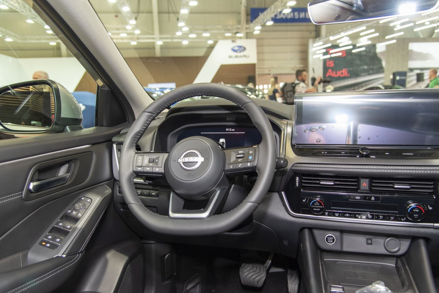 Digital instrument cluster and wide touchscreen display in car interior