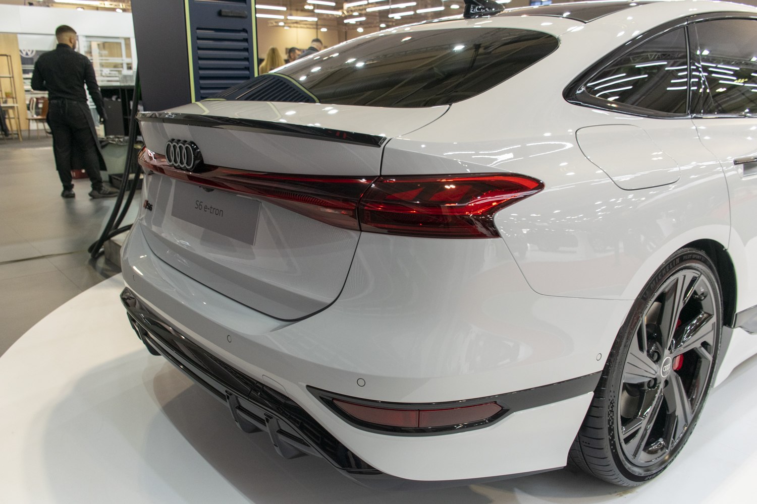 Sleek rear taillights and sporty black rims of a luxury sportback
