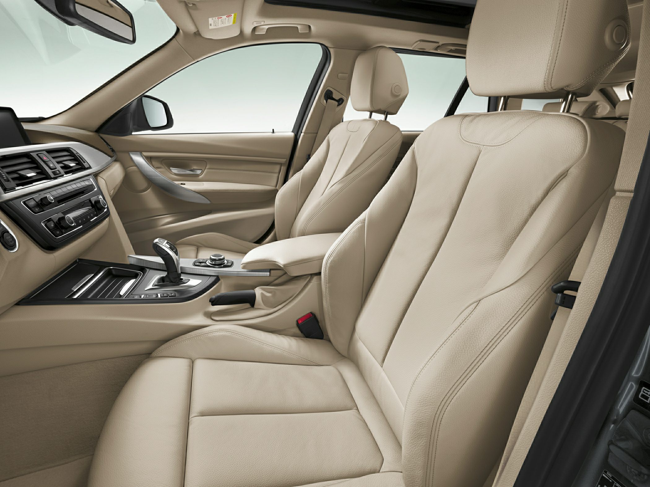 Beige leather seats and modern dashboard interior.
